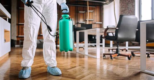 pest control professional in office